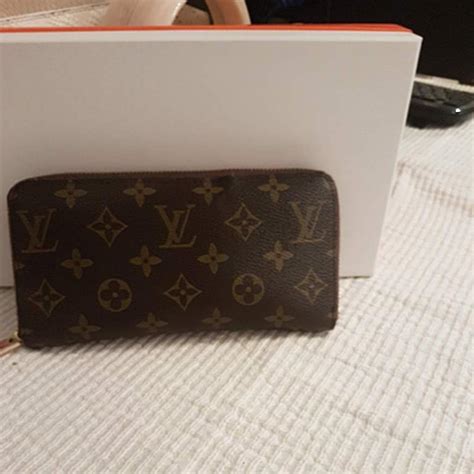 louis vuitton πορτοφολια